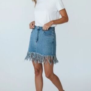 Daisy Denim Fringed Mini Skirt. Excellent Condition NWOT size Small.